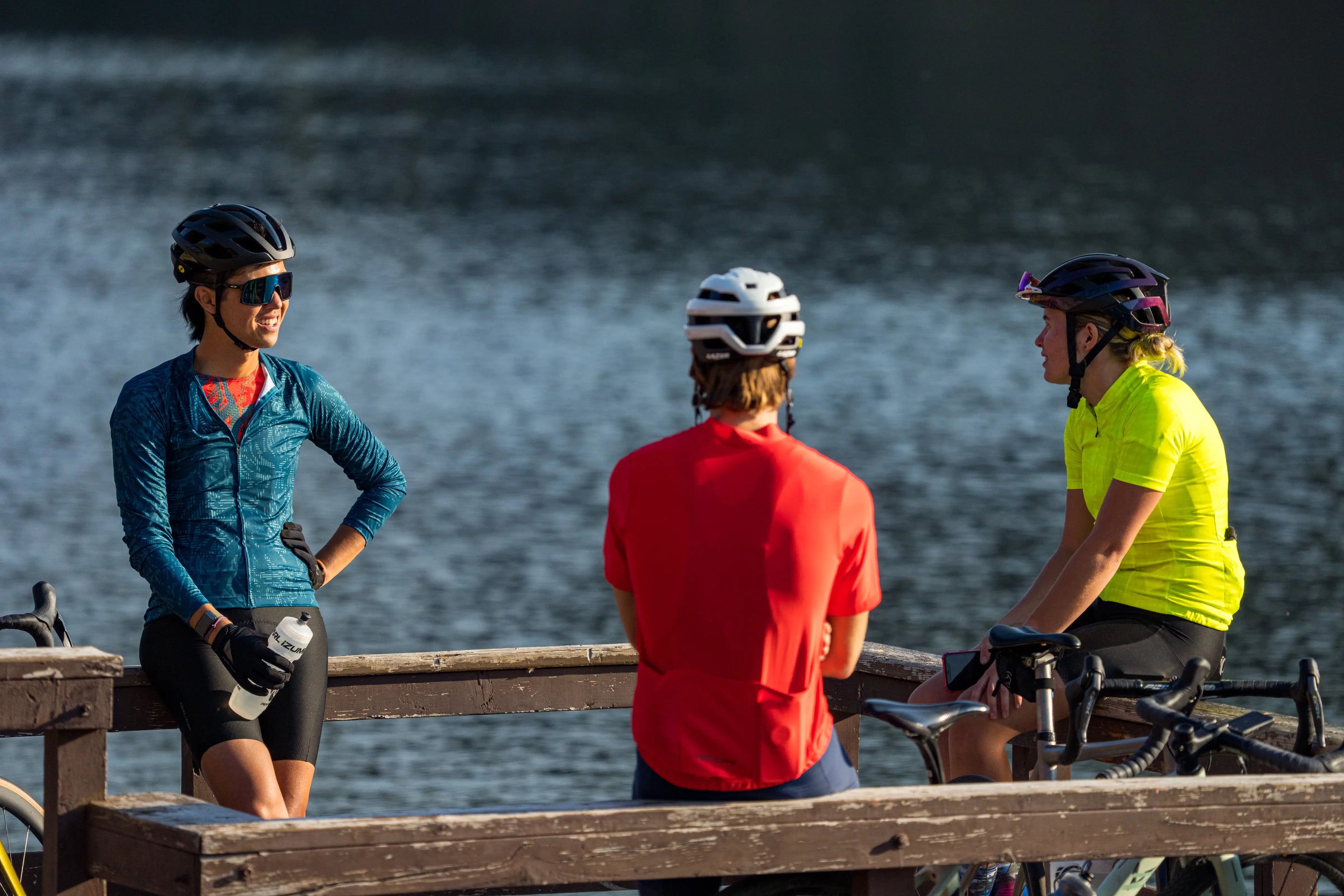 three cyclists talking in PEARL iZUMi cycling apparel